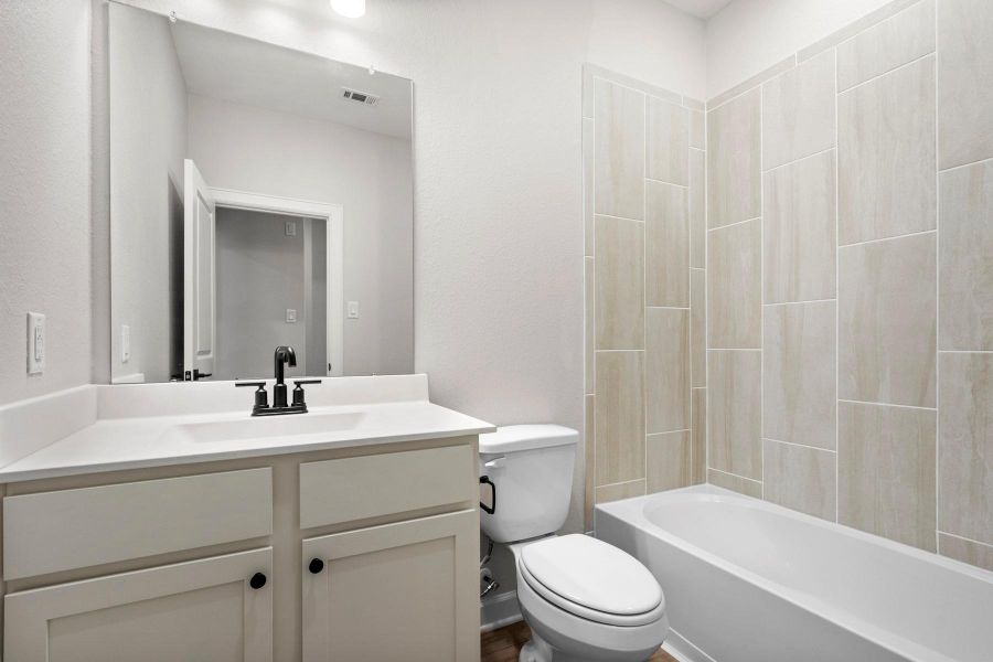 Furnished interior view inside a new home in Emberly, Beasley (Image 6).