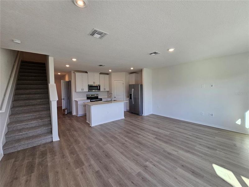 Spacious, unfurnished interior of a new home in The Reserve at Hammock Oaks Townes, Lady Lake (Image 8). Spacious, unfurnished interior of a new home in The Reserve at Hammock Oaks Townes, Lady Lake (Image 8).