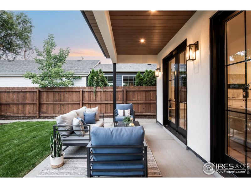 Roomy covered patio embraces the best of CO outdoor living