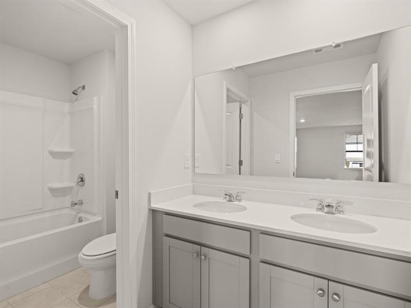 Furnished interior view inside a new home in Falcon Landing, Gainesville (Image 10).