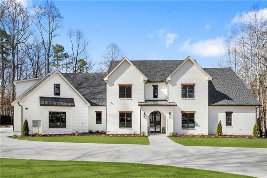 Front exterior of a new home in , Alpharetta, GA, highlighting curb appeal (Image 23). Front exterior of a new home in , Alpharetta, GA, highlighting curb appeal (Image 23).