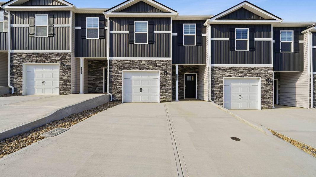 Front exterior of a new home in The Arbor Townhomes, Kingsport, TN, highlighting curb appeal (Image 16).
