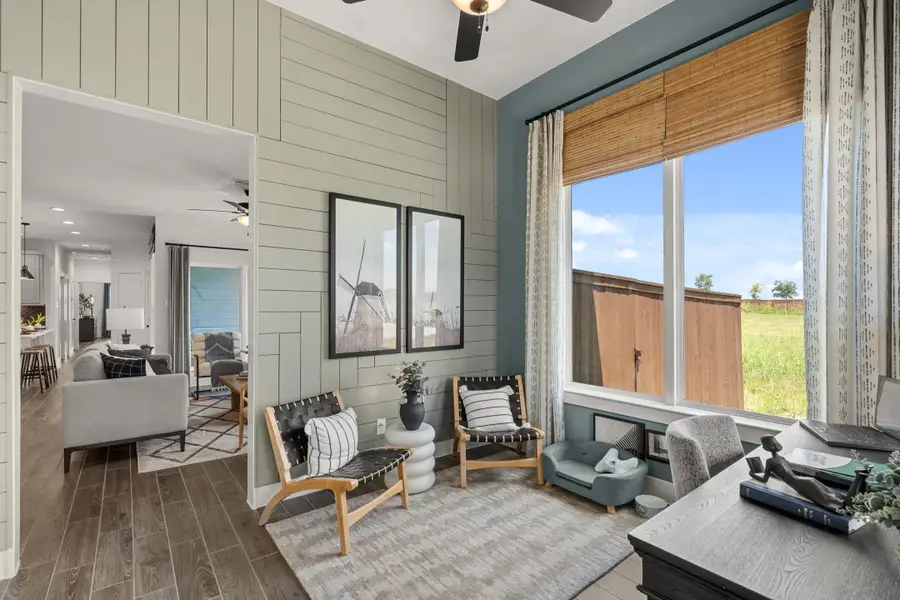 Exterior details and patio area of a home in Meridiana, Manvel (Image 3).