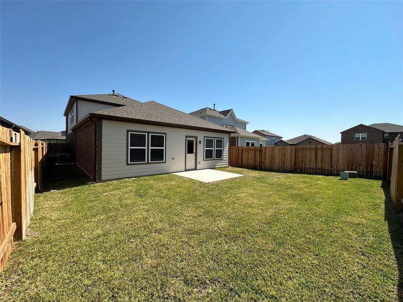 Exterior details and patio area of a home in Lonestar Collection at Aurora, Katy (Image 3).