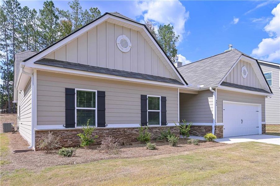 Front exterior of a new home in , Villa Rica, GA, highlighting curb appeal (Image 2). Front exterior of a new home in , Villa Rica, GA, highlighting curb appeal (Image 2).