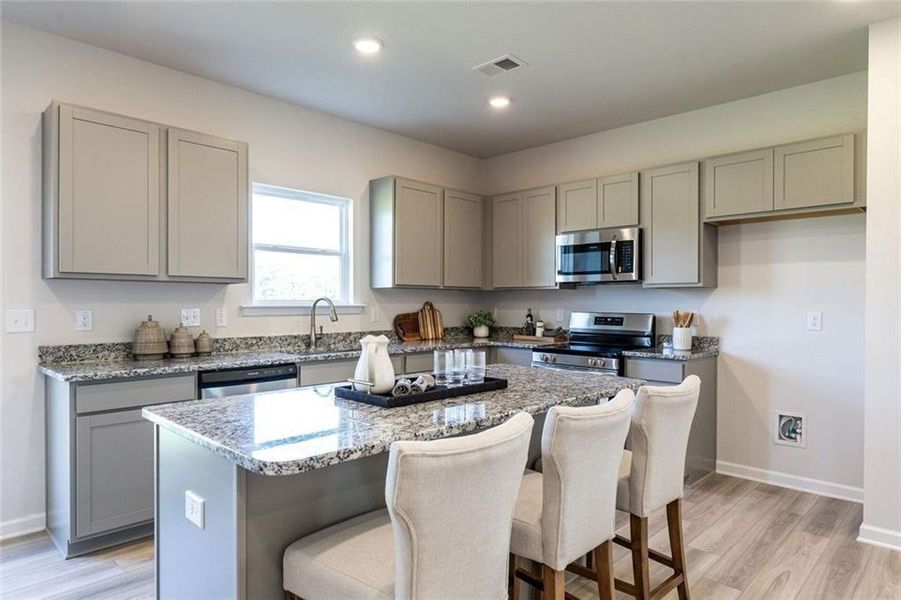 Furnished interior view inside a new home in The Andros, Dalton (Image 9).