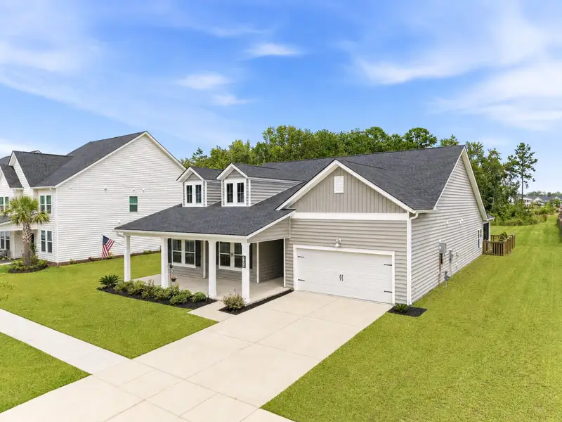Front exterior of a new home in , Summerville, SC, highlighting curb appeal (Image 26).