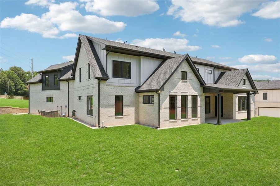Front exterior of a new home in , Braselton, GA, highlighting curb appeal (Image 35). Front exterior of a new home in , Braselton, GA, highlighting curb appeal (Image 35).