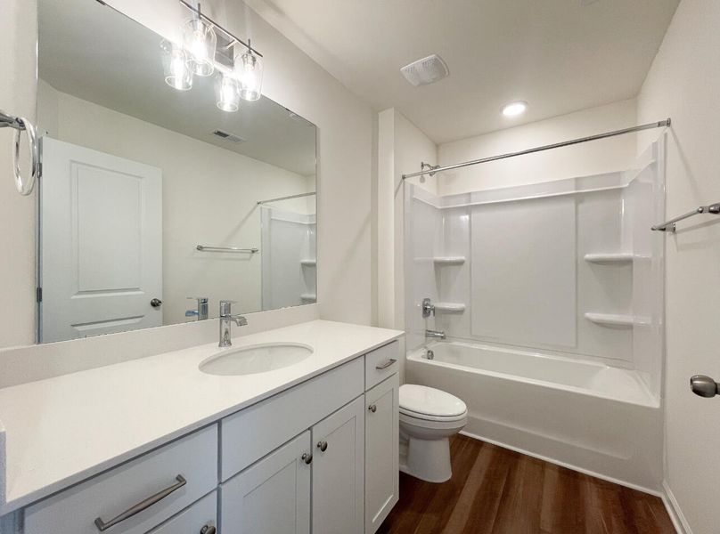 Furnished interior view inside a new home in Bellevue Townhomes, Greenville (Image 9).