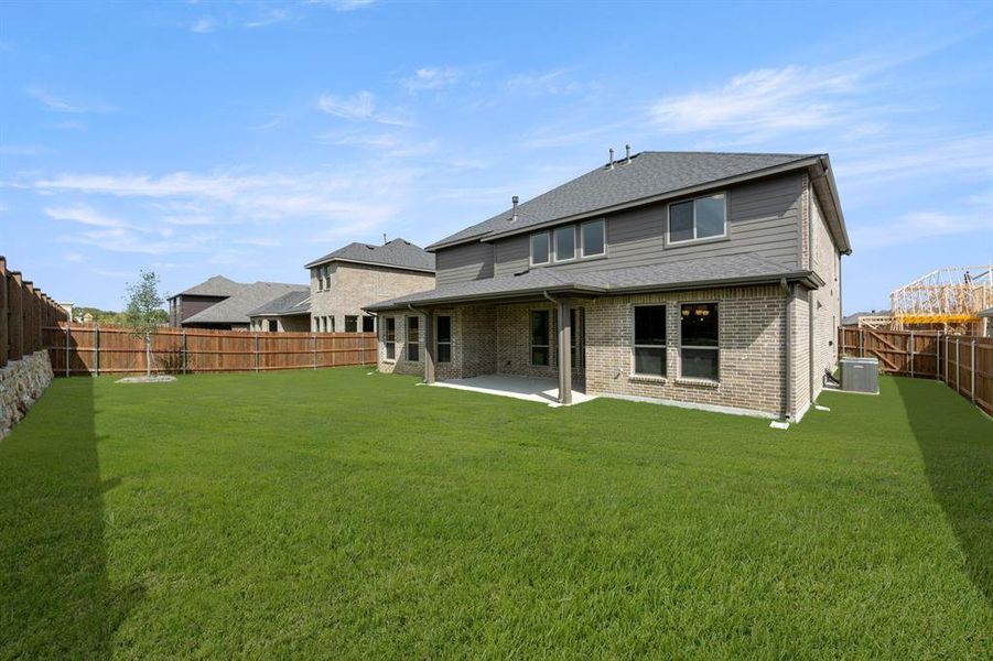 Exterior details and patio area of a home in Somerset - Phase 5, Mansfield (Image 21). Exterior details and patio area of a home in Somerset - Phase 5, Mansfield (Image 21).