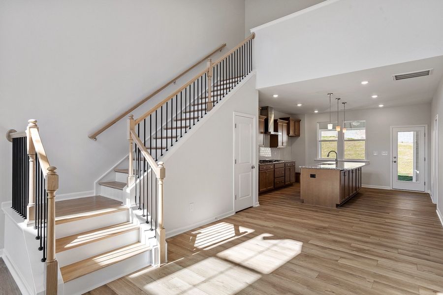 Spacious, unfurnished interior of a new home in Ovation at Sweetbrier, Durham (Image 17).