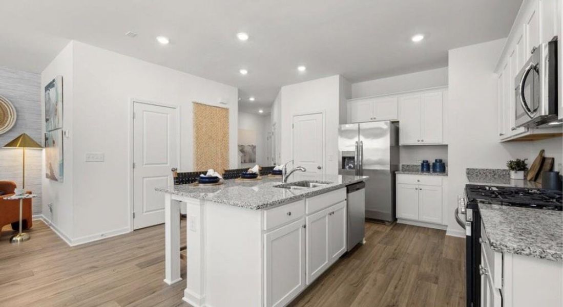 Furnished interior view inside a new home in Towns at Ivy Creek, Buford (Image 15).