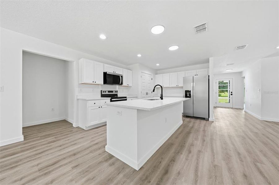 Furnished interior view inside a new home in , Dunnellon (Image 14).