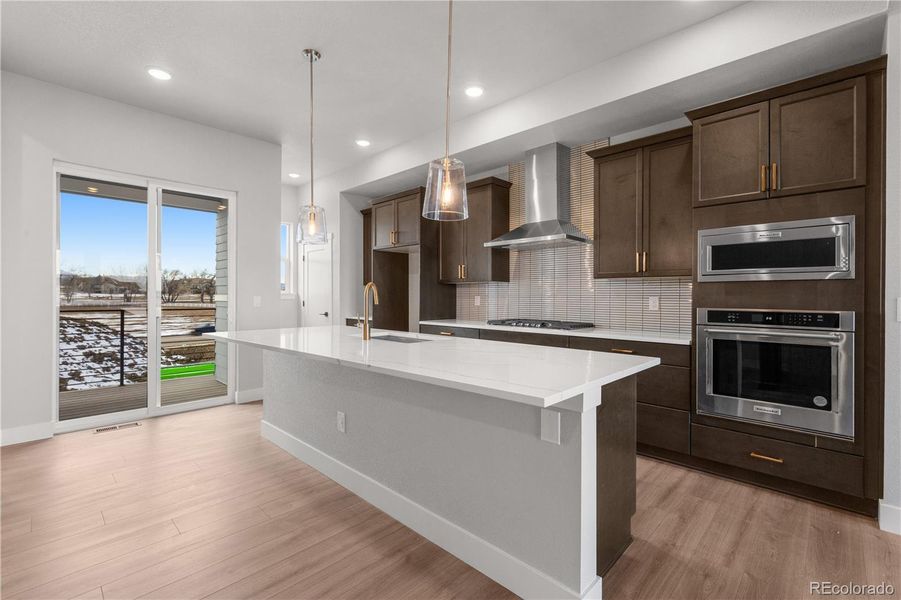 Furnished interior view inside a new home in Dillon Pointe - Skyview, Broomfield (Image 3).