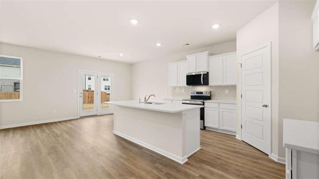 Furnished interior view inside a new home in The Preserve at Agricultural Village, Perry (Image 2). Furnished interior view inside a new home in The Preserve at Agricultural Village, Perry (Image 2).