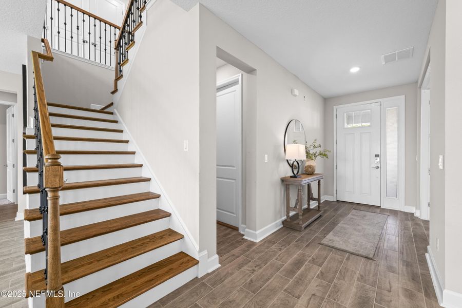 Furnished interior view inside a new home in The Cove at Beachwalk, St. Johns (Image 38). Furnished interior view inside a new home in The Cove at Beachwalk, St. Johns (Image 38).