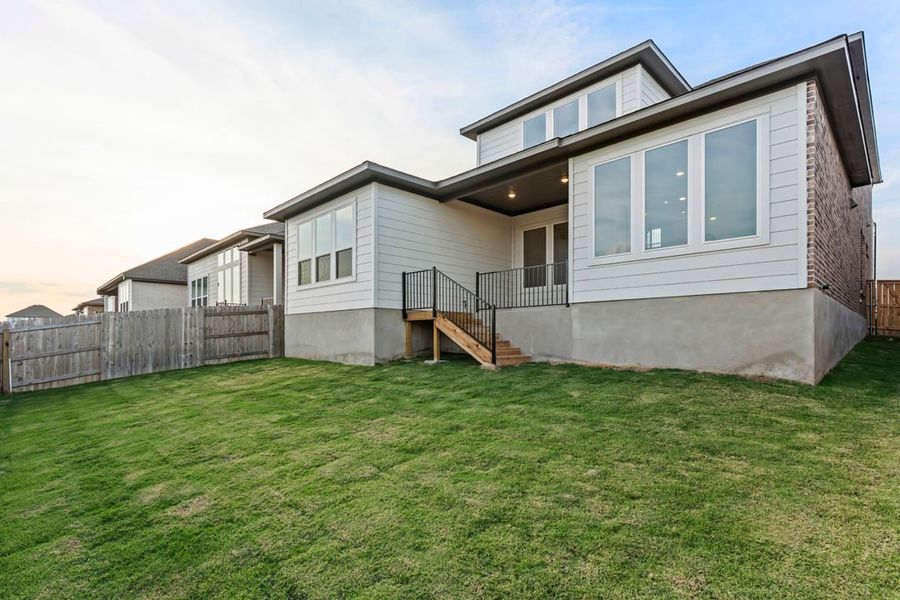 Exterior details and patio area of a home in Park Collection at Lariat, Liberty Hill (Image 28). Exterior details and patio area of a home in Park Collection at Lariat, Liberty Hill (Image 28).