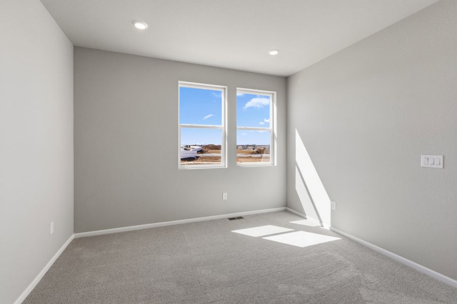 Spacious, unfurnished interior of a new home in The Estates Collection at Murphy Creek, Aurora (Image 23).