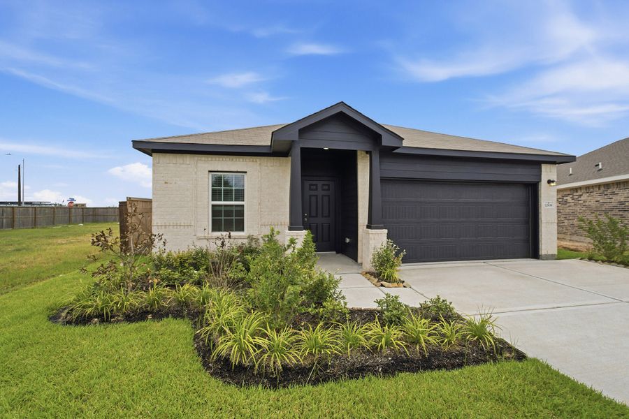 Front exterior of a new home in Harvest Pointe, Needville, TX, highlighting curb appeal (Image 2).