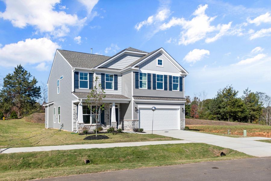 Front exterior of a new home in Pisgah Park, Kernersville, NC, highlighting curb appeal (Image 20).