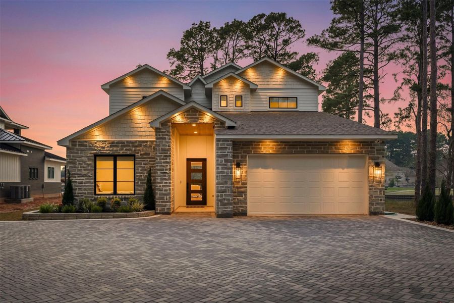 Front exterior of a new home in , Willis, TX, highlighting curb appeal (Image 2).