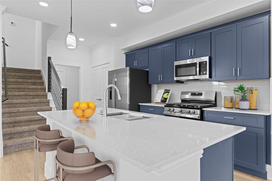 Down the hallway to the left is the laundry room.  Just look how gorgeous this home is!  * Virtual stage*