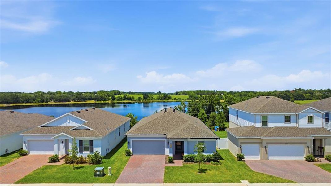 Front exterior of a new home in , Groveland, FL, highlighting curb appeal (Image 24).
