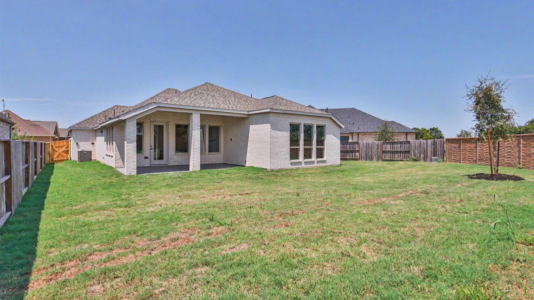 Exterior details and patio area of a home in , Manvel (Image 4).