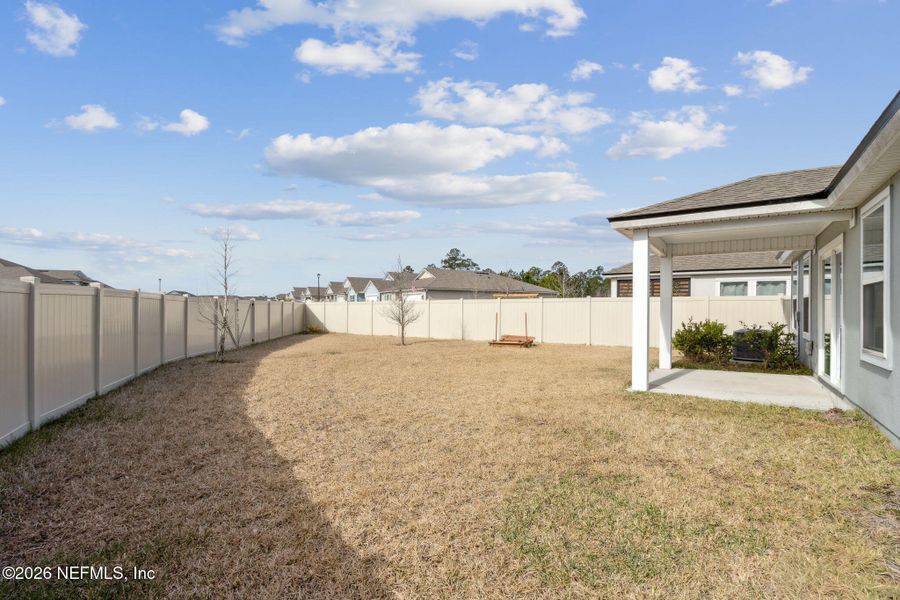 Exterior details and patio area of a home in , Yulee (Image 20).