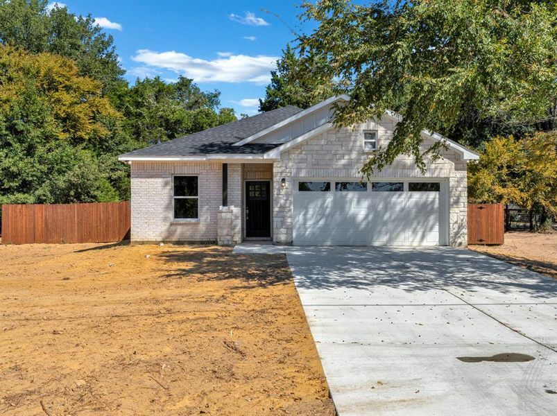 View of front facade with a garage