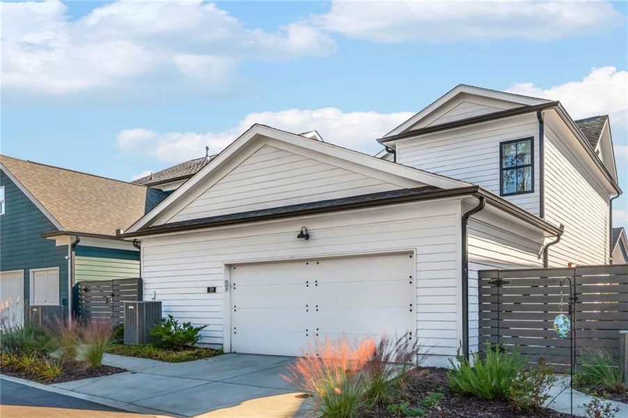 Front exterior of a new home in Harmony, Auburn, GA, highlighting curb appeal (Image 24).