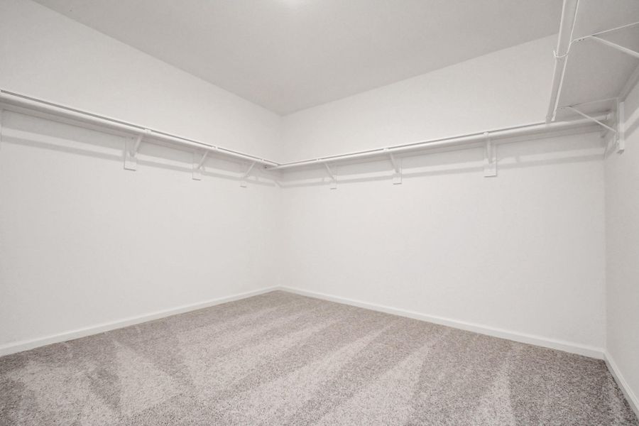 Spacious, unfurnished interior of a new home in Sunterra, Katy (Image 28).