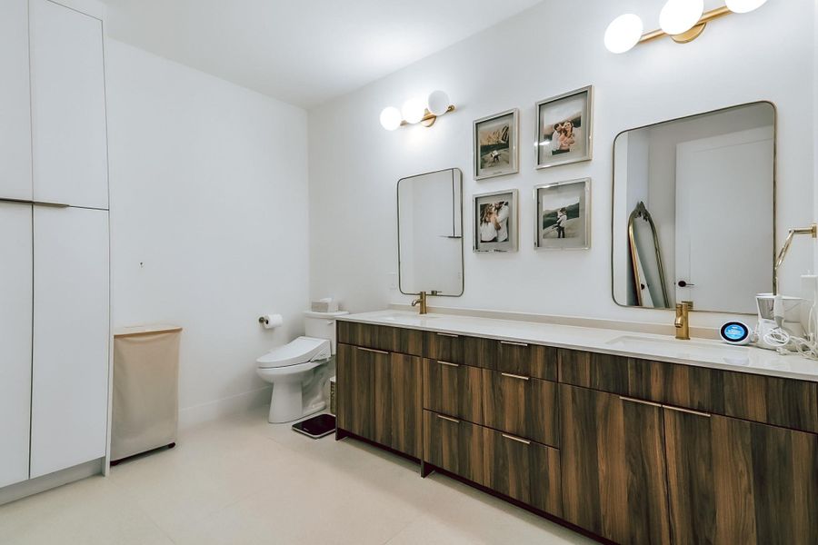 Full bathroom with double vanity