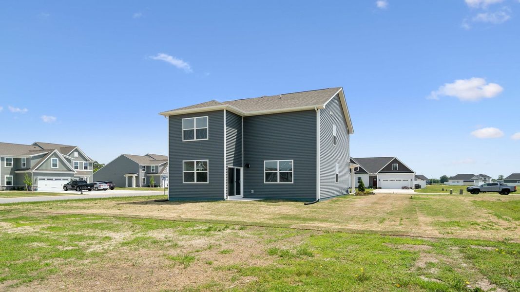 Representative exterior photo of a completed home built from the Pine by D.R. Horton in Tooley Harbor, Elizabeth City, NC (Image 25).