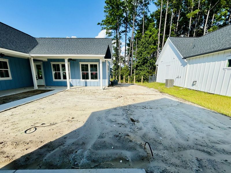Exterior details and patio area of a home in The Domus Collection at Midtown Nexton, Summerville (Image 35).