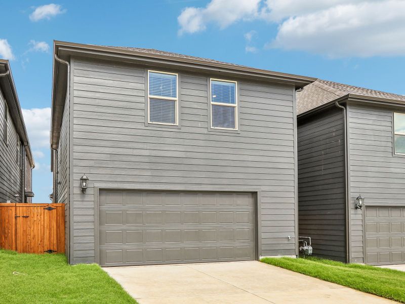 Front exterior of a new home in Oak Ridge Park, Corinth, TX, highlighting curb appeal (Image 19).