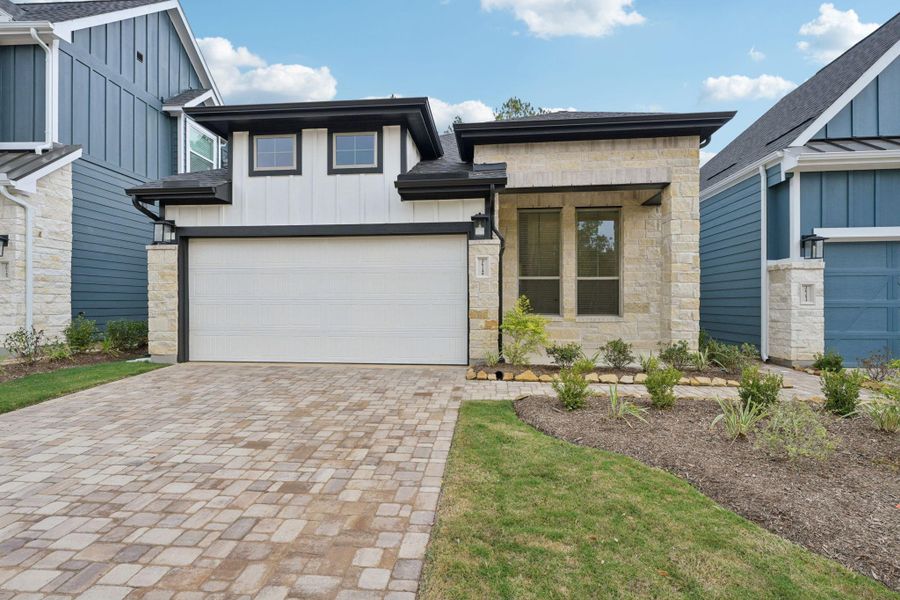 Front exterior of a new home in Kresston, Montgomery, TX, highlighting curb appeal (Image 1). Front exterior of a new home in Kresston, Montgomery, TX, highlighting curb appeal (Image 1).