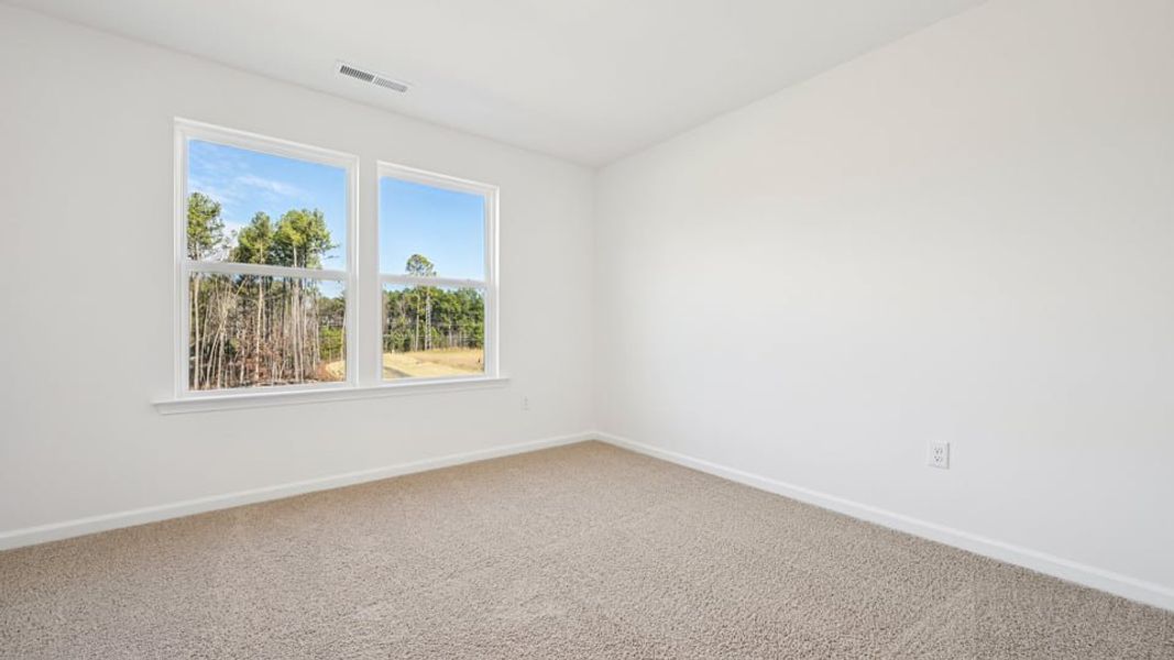 Spacious, unfurnished interior of a new home in Chapel Townes, Raleigh (Image 26).