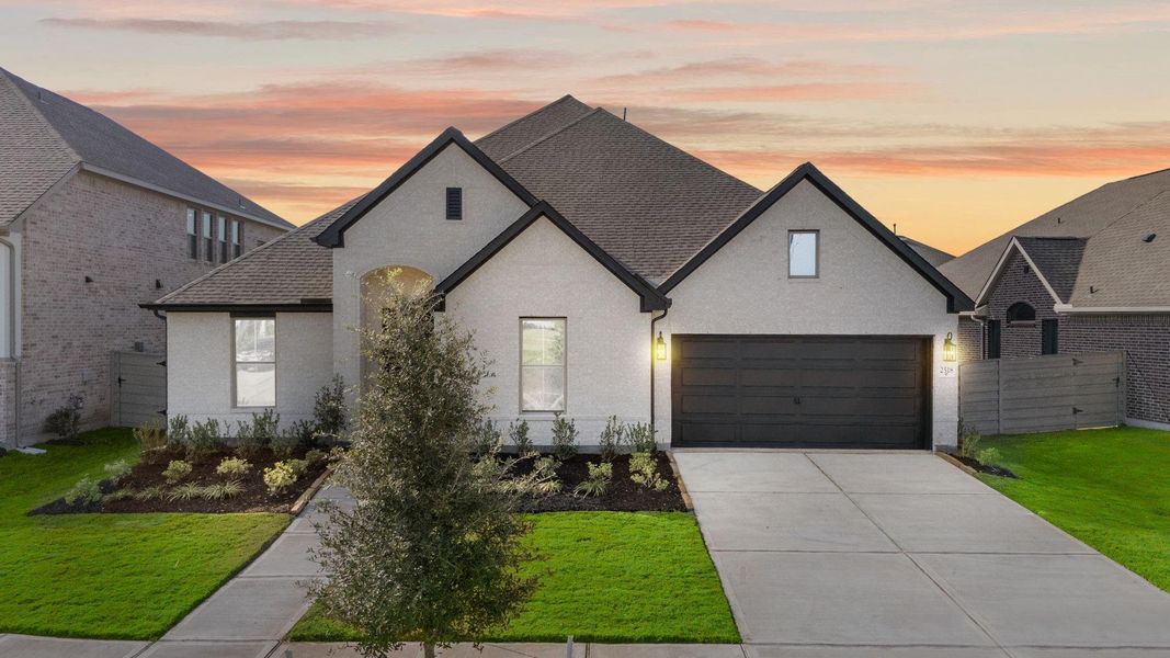 Front exterior of a new home in Pomona, Manvel, TX, highlighting curb appeal (Image 19).