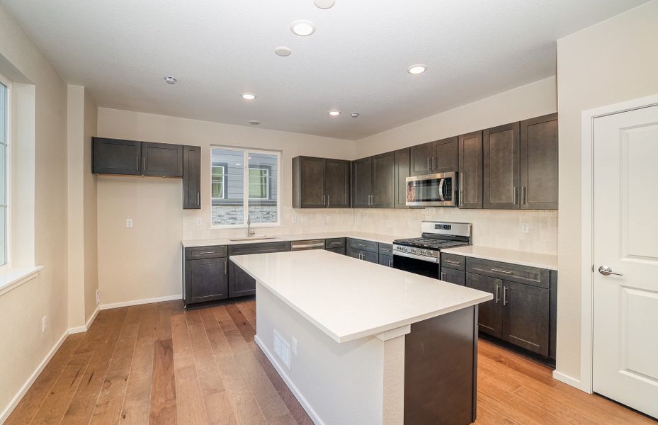 Kitchen with stunning white quartz countertops