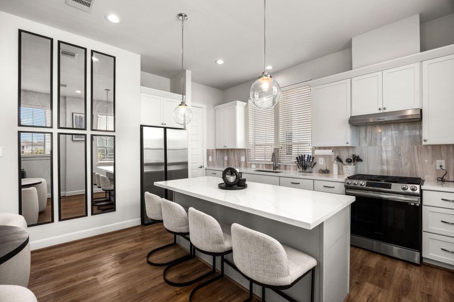 Furnished interior view inside a new home in The Corner At Buffalo Pointe, Houston (Image 7).