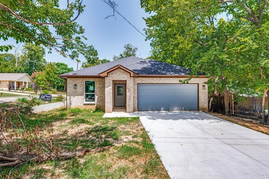 View of front of house with a garage