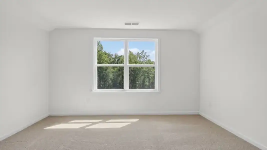 Spacious, unfurnished interior of a new home in The Villas at Galvins Ridge, Sanford (Image 26).