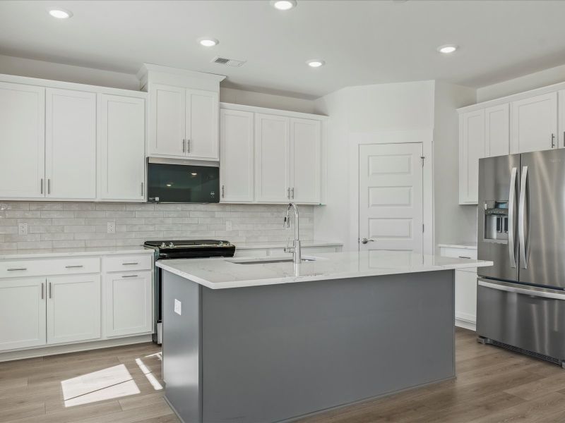 Furnished interior view inside a new home in The Coves at Lakes of Cane Bay II, Summerville (Image 8).