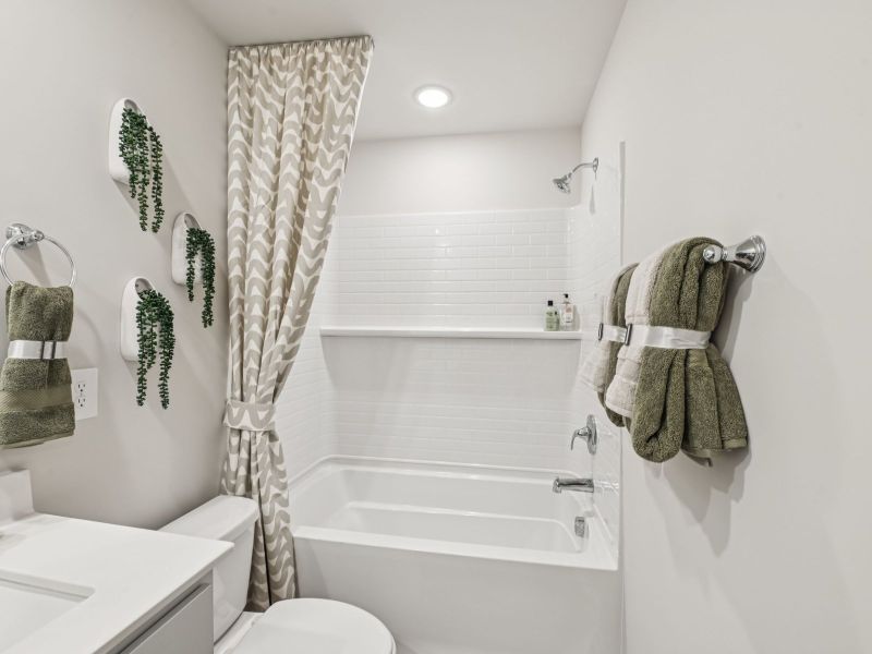 Secondary bathroom in the Chatham floorplan at a Meritage Homes community in Mebane, NC. Secondary bathroom in the Chatham floorplan at a Meritage Homes community in Mebane, NC.