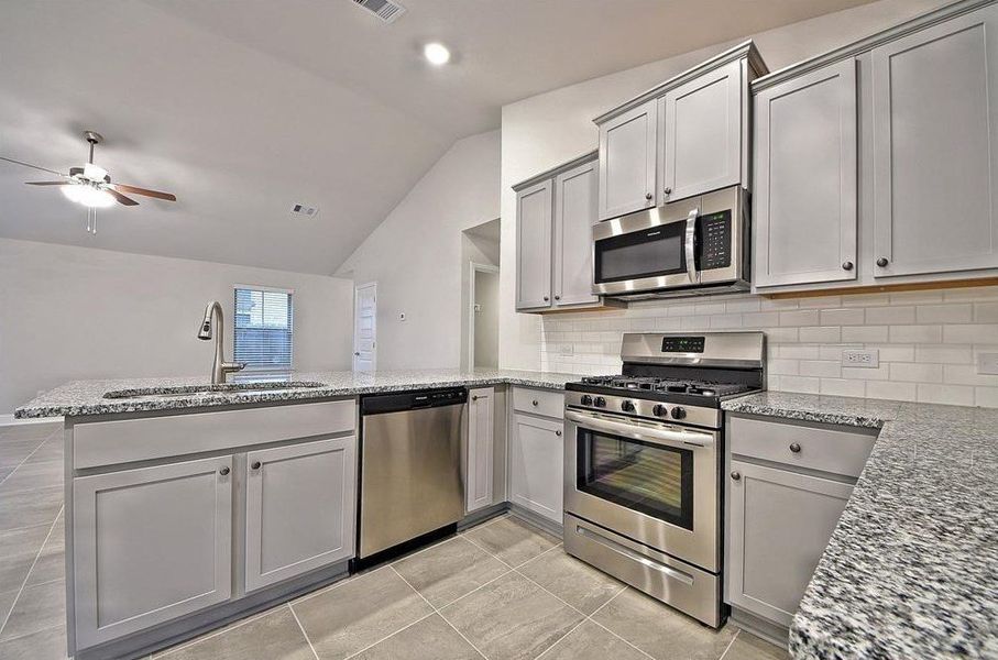 Furnished interior view inside a new home in Bayou Maison, Dickinson (Image 4).