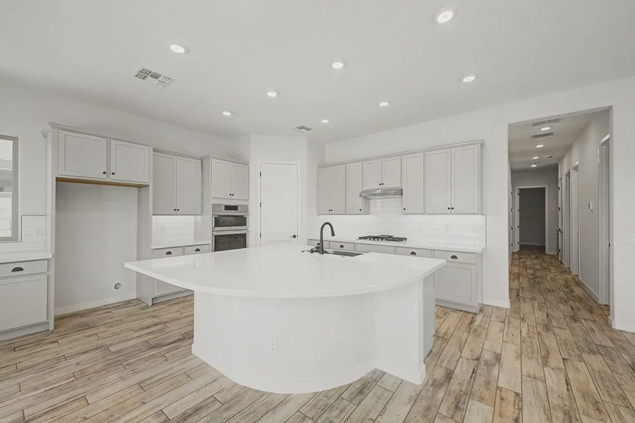Furnished interior view inside a new home in Valencia at Granite Vista, Waddell (Image 6).