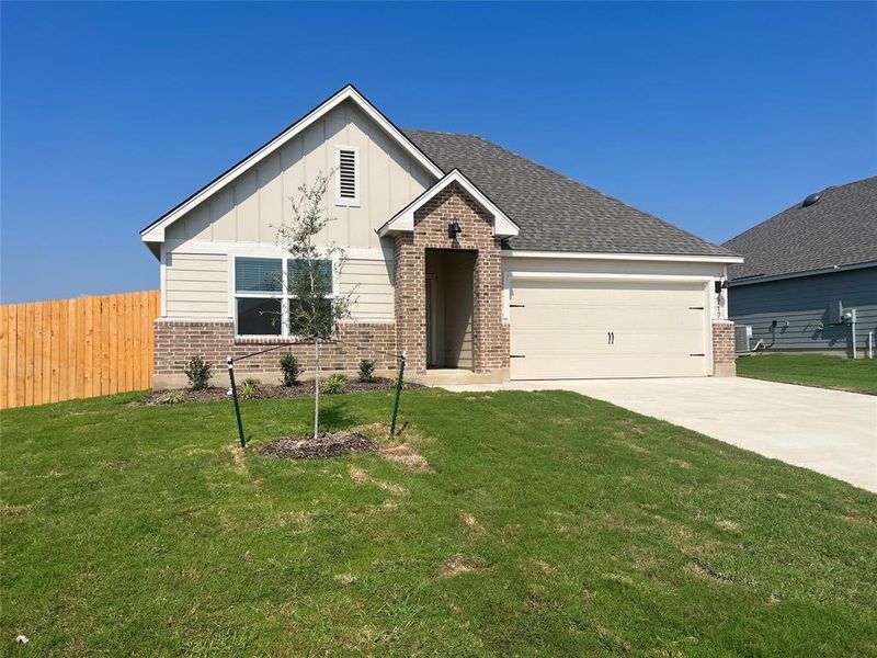 Front exterior of a new home in Park Meadows, Lorena, TX, highlighting curb appeal (Image 13).