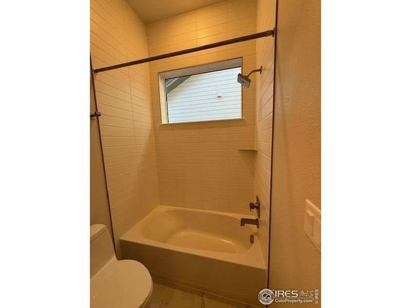 Furnished interior view inside a new home in West Grange, Longmont (Image 4).