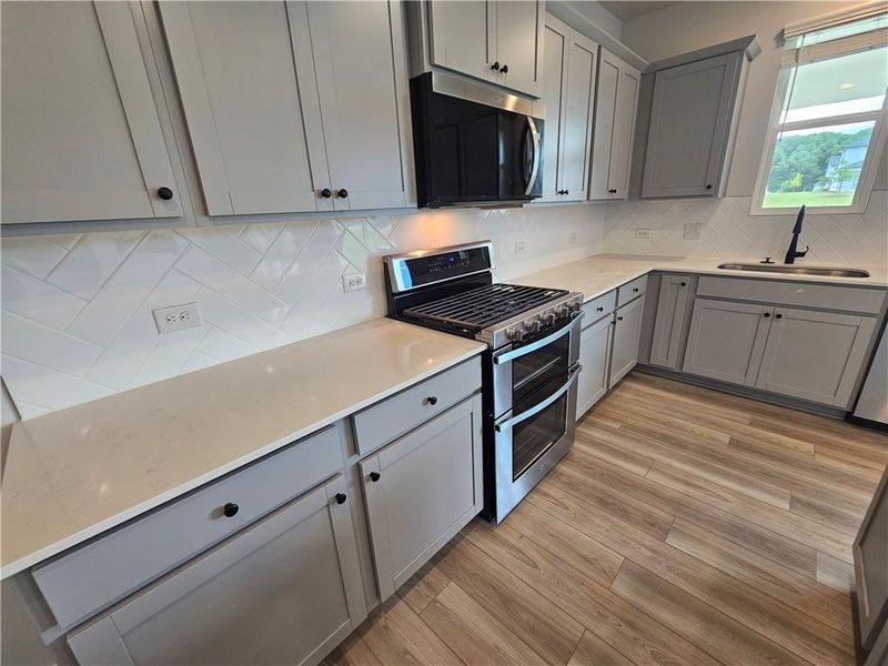 Furnished interior view inside a new home in Ellorie Estates, Dawsonville (Image 8).